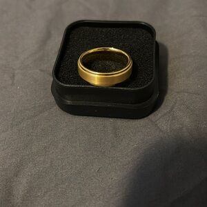 Triton Gold Tungsten gold wedding band.